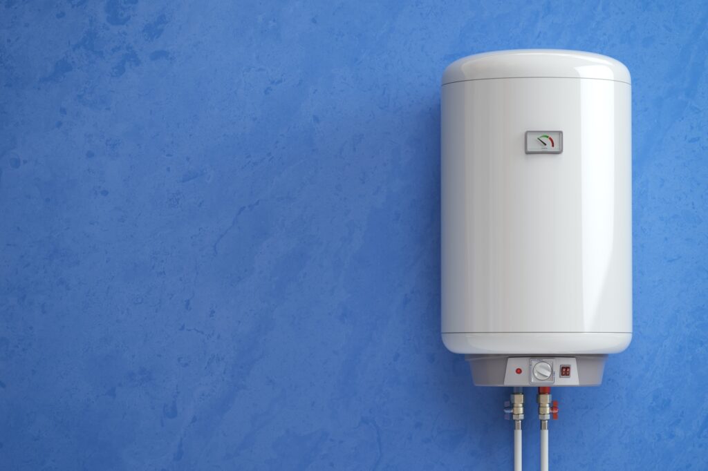 Electric boiler, water heater on the blue wall.